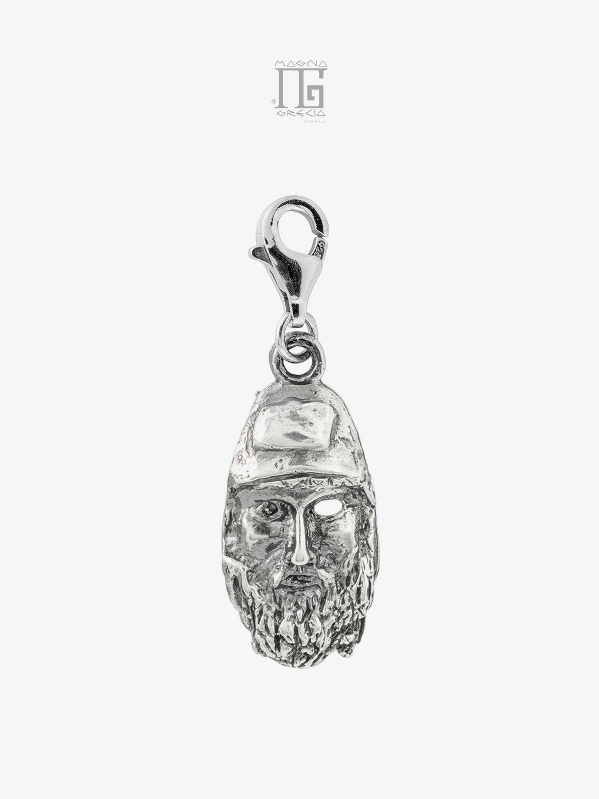 Silver charm depicting the face of the Riace Bronze B Cod. MGK 3704 V-61