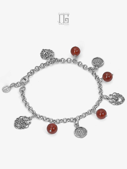 Silver Bracelet with Apotropaic Masks, Stater and Carnelian Cod. MGK 4034 V