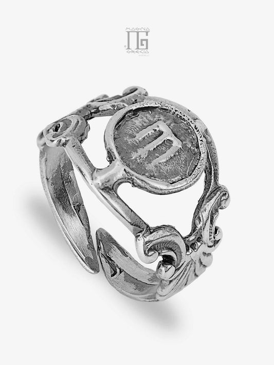 Silver ring depicting the Stater Code MGK 4050 V