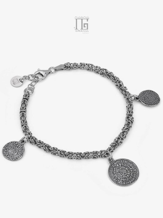 Silver bracelet with coins depicting the Phaistos Disc Cod. MGK 4240 V